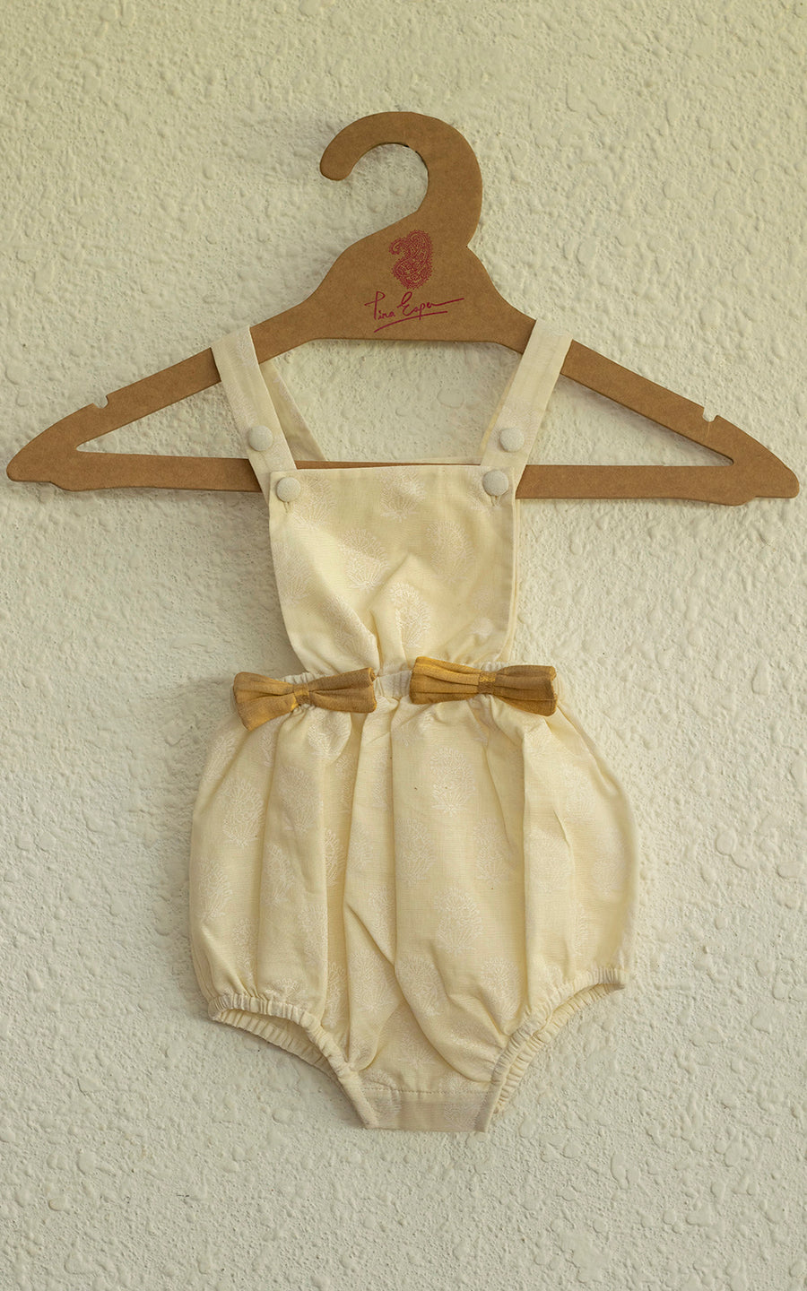 EASY BREEZY HAND BLOCK PRINTED ROMPER IN COTTON KASAVU WITH BOWS AT THE FRONT